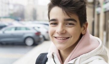 Teen boy with orthodontics