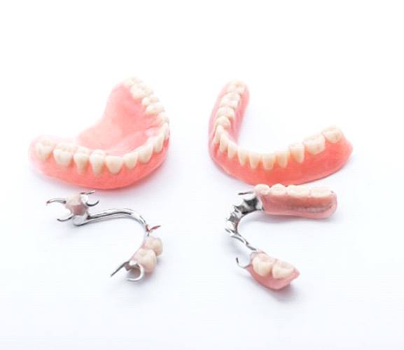 two full dentures and two partials