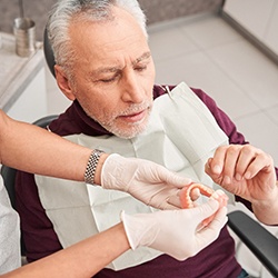 Man at the dentist getting dentures