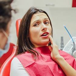 Woman at dentist with toothache