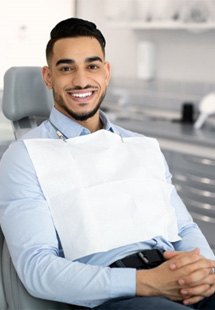 a patient smiling after undergoing cosmetic dentistry near Farmer’s Branch