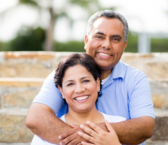 Man and woman with dental bridge restorations