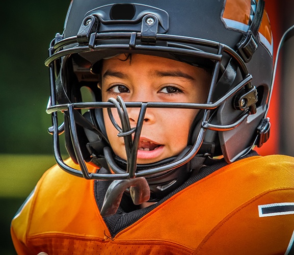 Athletic mouthguards are devices used to protect your child’s teeth during sports