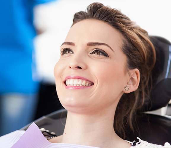 Woman with healthy smile after preventive dentistry checkup