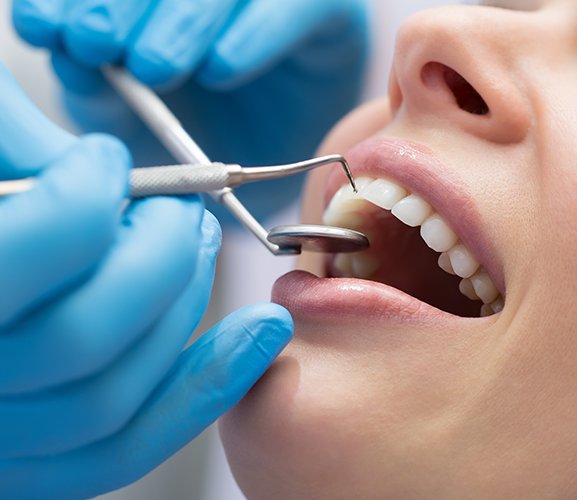 Patient receiving periodontal therapy