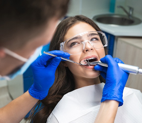 A woman getting a root canal