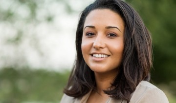 Woman with gorgeous smile after cosmetic dentistry