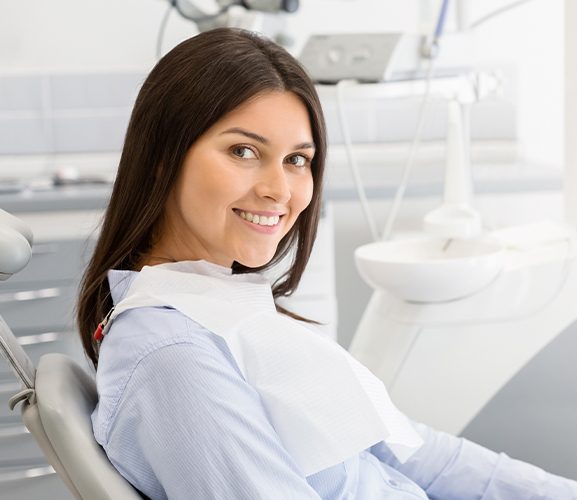 Smiling woman in dental chair