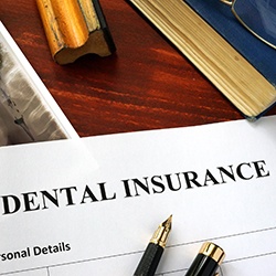 Dental insurance form on desk