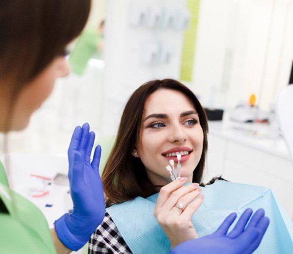 woman getting veneers in Dallas