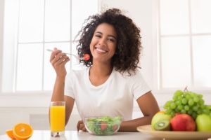 woman eating a salad