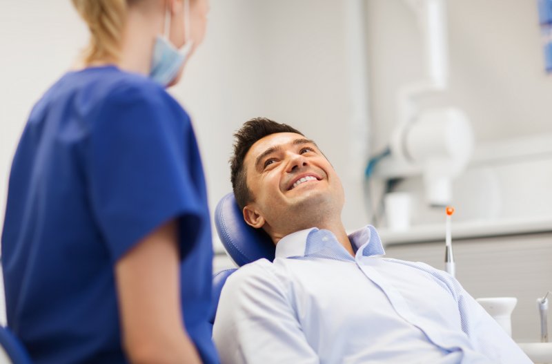 a patient receiving a dental crown in Dallas